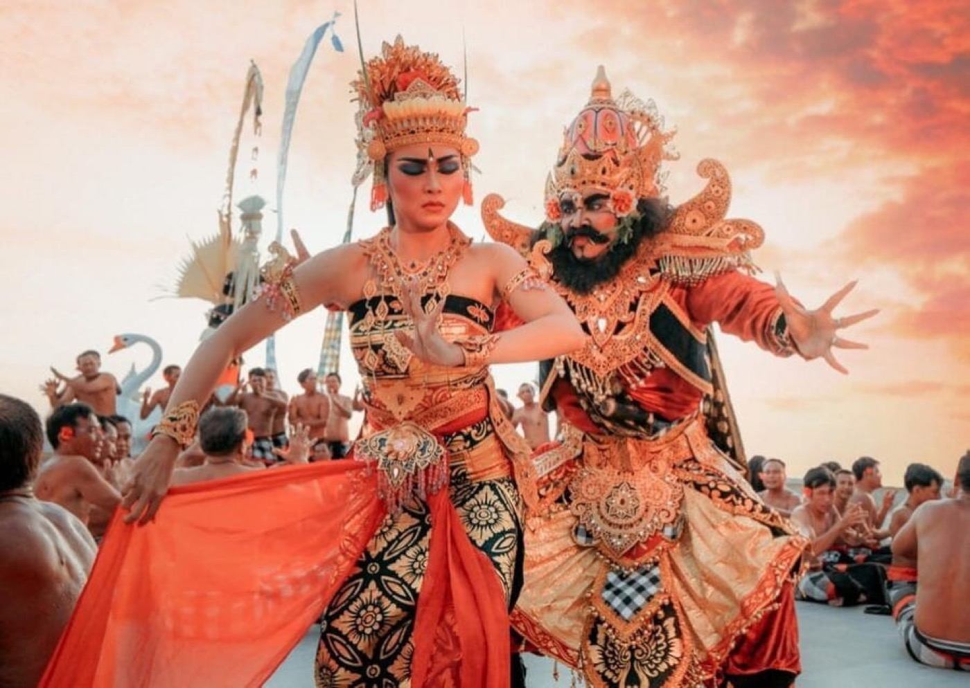 Balinese dancers performing at sunset