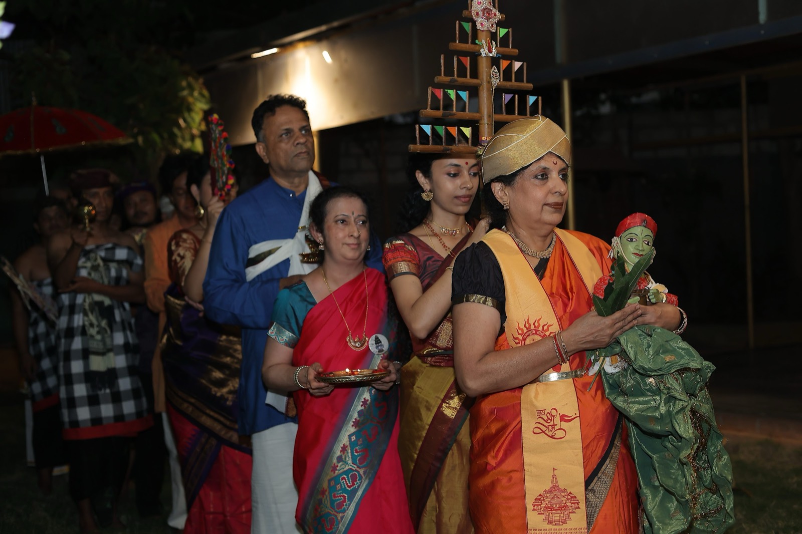 Indian and Indonesian puppeteers with their puppets