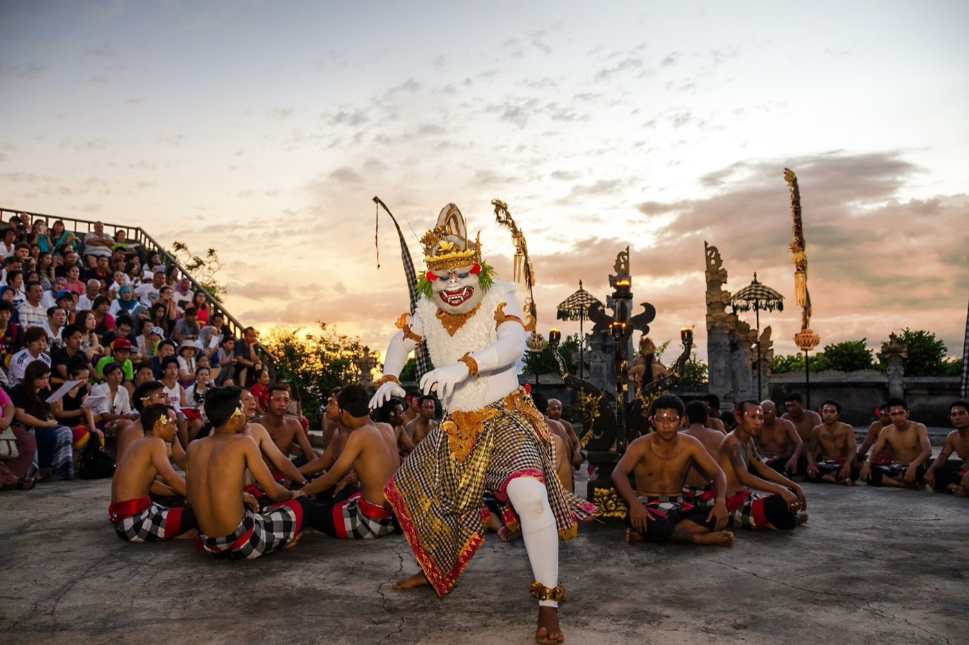 Kecak dancer as Hanuman at sunset